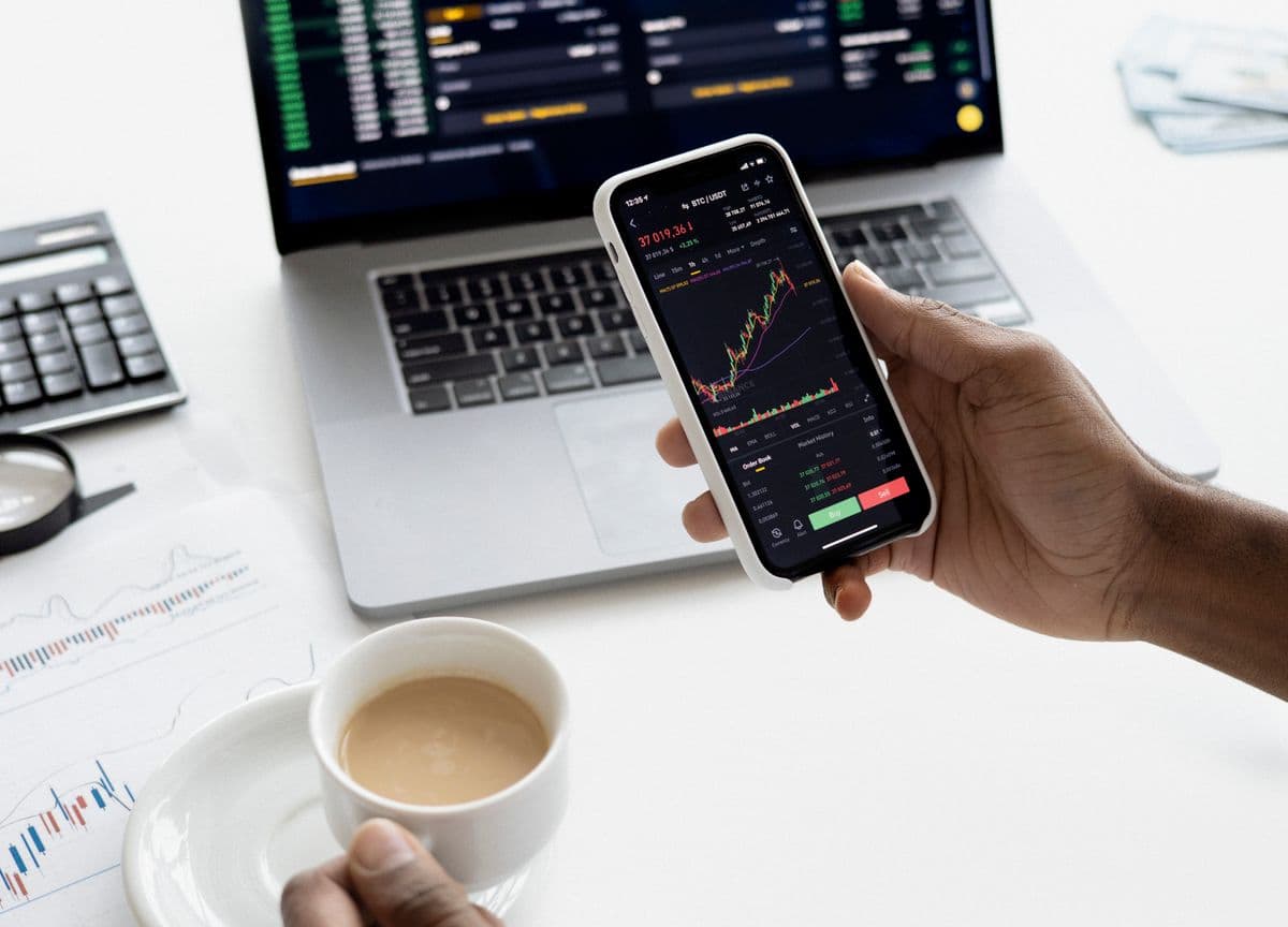 Stock market candlestick chart on a monitor